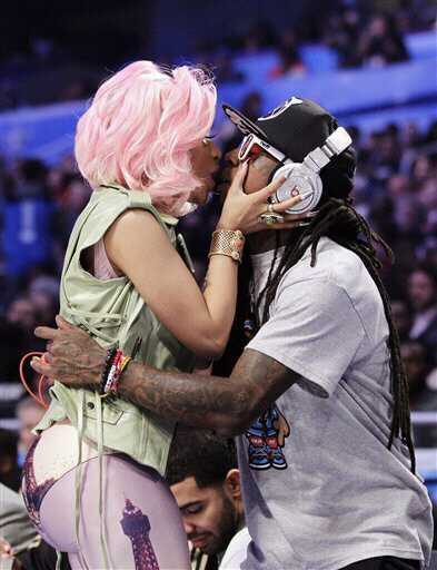 photo12 Lil Wayne & Nicki Minaj Kiss + Weezy Displays His Diamond Encrusted Beats By Dre (Photo Inside)  